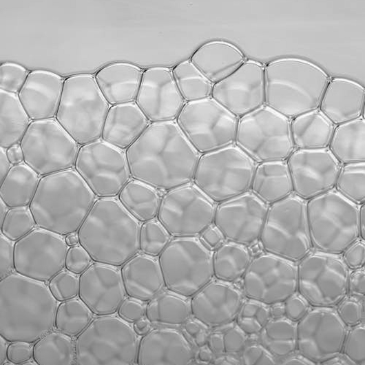 black and white photo of water bubbles