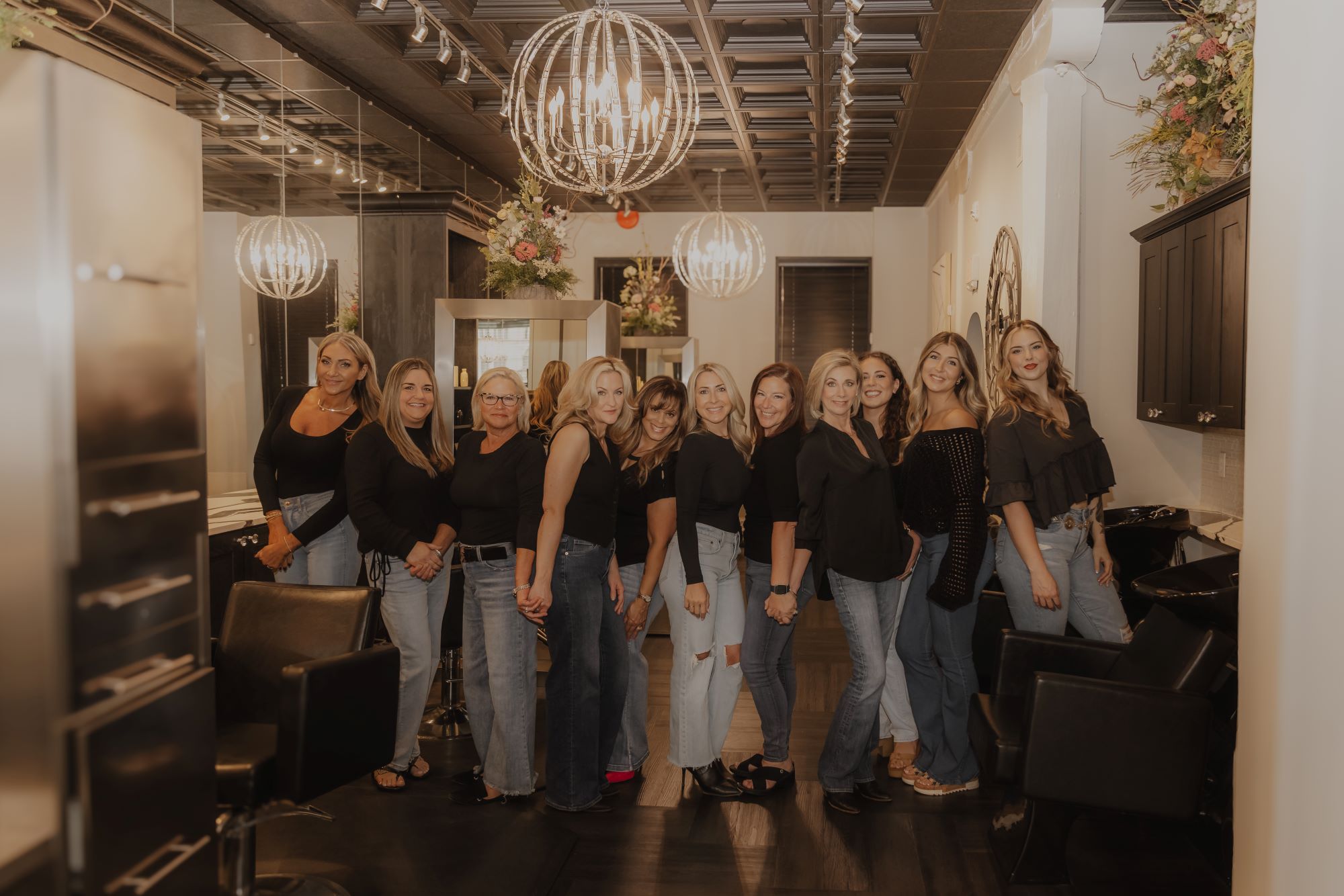 inspire at the grainery team photo inside the salon